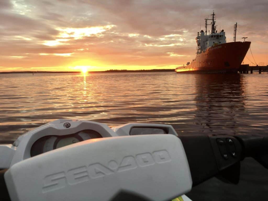 Polar icebreaker cruise during sunset in lapland